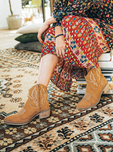Boots motifs surpiqués style santiags