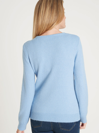 Pull avec jeu de maille pointelle