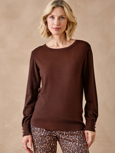 Pull boutons-bijoux aux manches