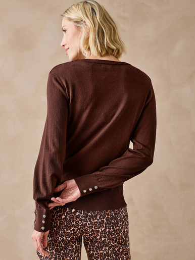 Pull boutons-bijoux aux manches