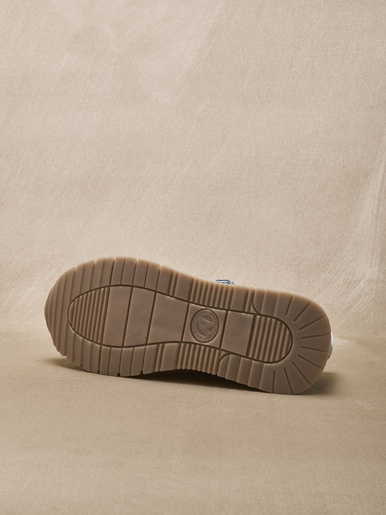 Baskets fermées par zip et lacets