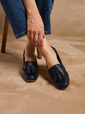 Mocassins à pompons