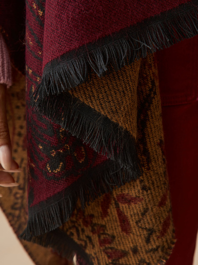 Poncho jacquard à franges